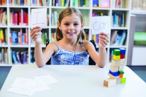 bigstock Disabled girl holding placard 137694131